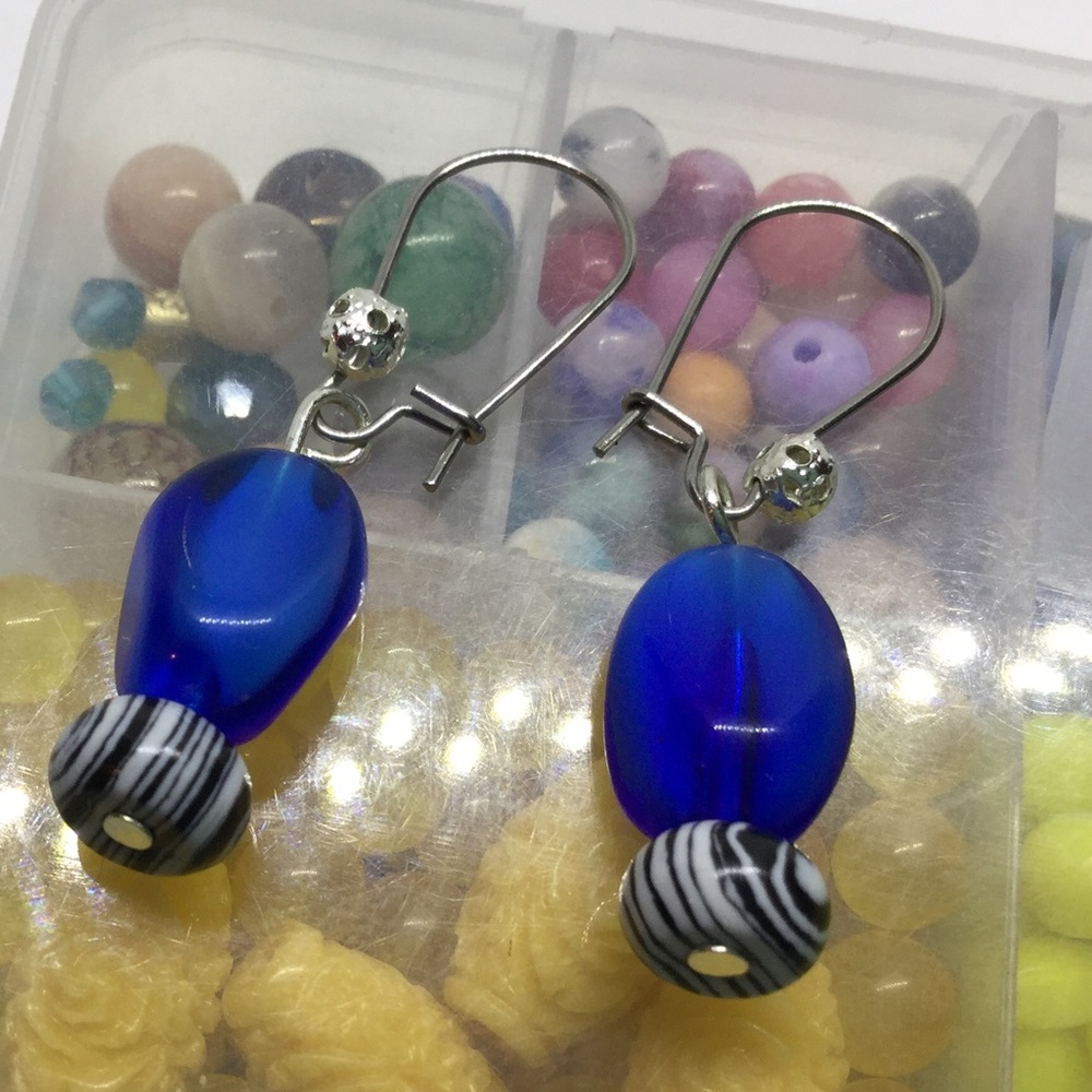 Black/white print and blue gemstone earrings